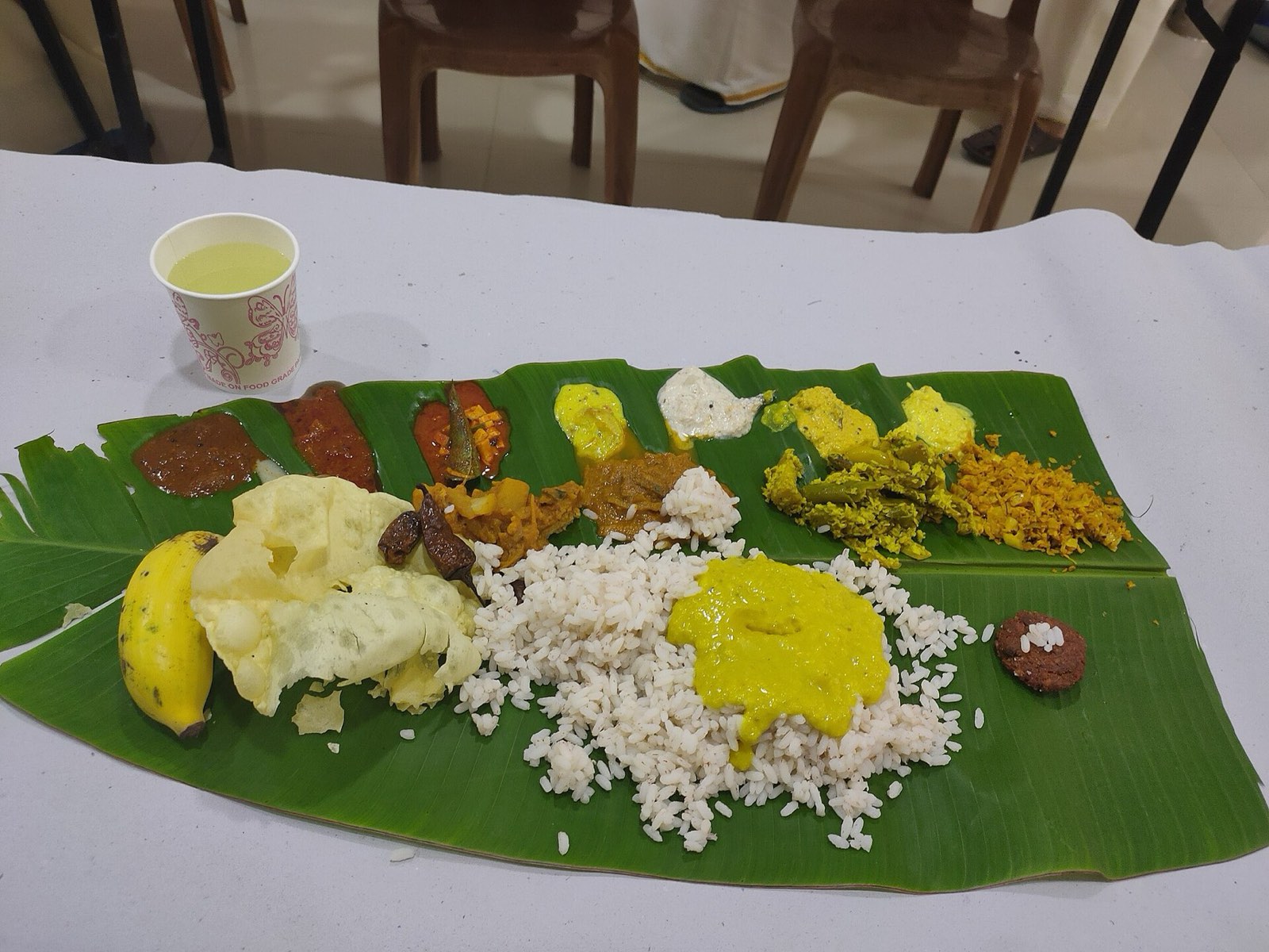 Traditional Kerala sadya served on a banana leaf